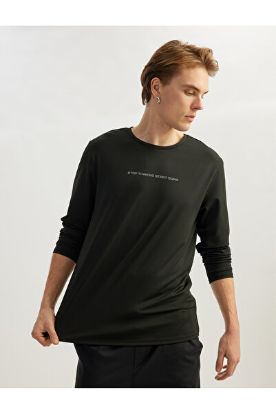 Koton Oversize-Sport-Sweatshirt mit Slogan-Print, langen Ärmeln und Rundhalsa...