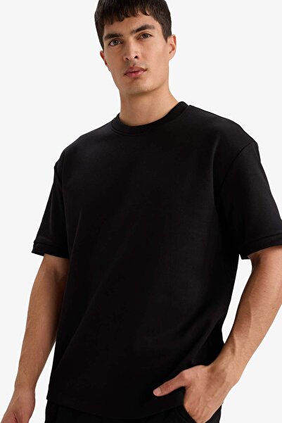 DeFacto Übergroßes Kurzarm-T-Shirt mit Rundhalsausschnitt B6494AX26SP