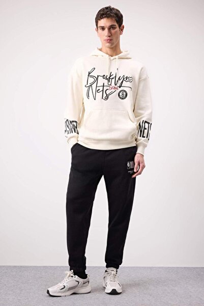 DeFacto NBA Wordmark DeFactoFit - بنطال رياضي سميك مع جيوب وأرجل مطاطية D6576...