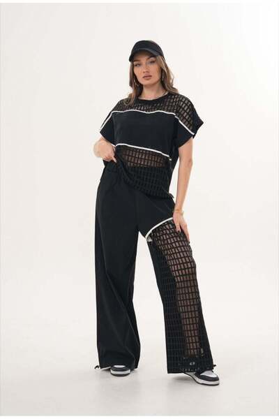 shE tekstil طقم رياضي شبكي قص بالليزر