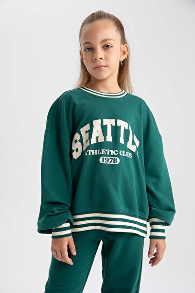 DeFacto Kız Çocuk Oversize Geniş Kalıp Bisiklet Yaka Baskılı Sweatshirt A5981...
