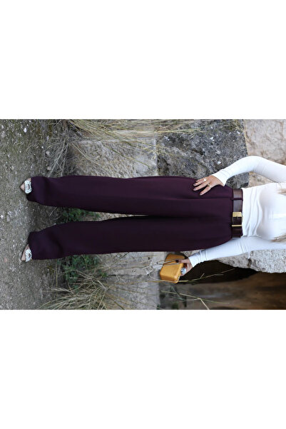 bytugcekaya تفاصيل الجيب الخلفي باللون البرقوقي بالازو