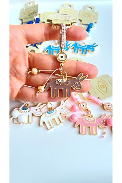 Cassime Μπρελόκ με μπεζ σχέδιο γαϊδούρας, επιχρυσωμένο, με μάτι της κακούλας