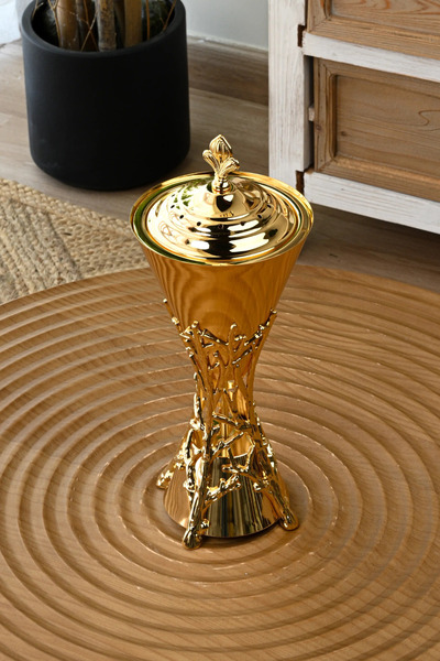 SQUALO A luxurious gold incense burner with a modern Squalo design – a work o...