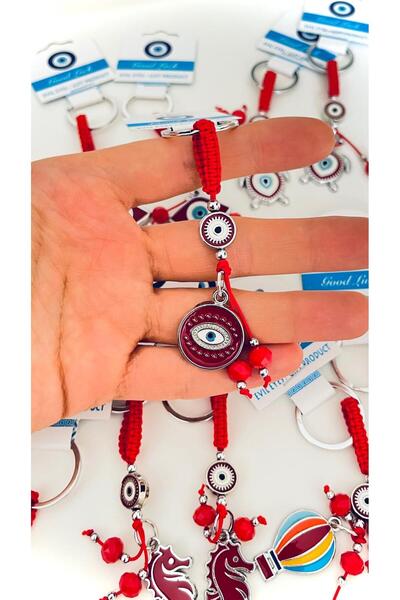 Cassime Κόκκινο μπρελόκ με στρογγυλό σχέδιο ματιών, επιχρυσωμένο, με διακοσμη...