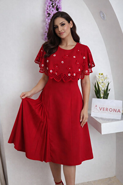 Verona Elegant women's midi dress with a decorative cape design and side pleat