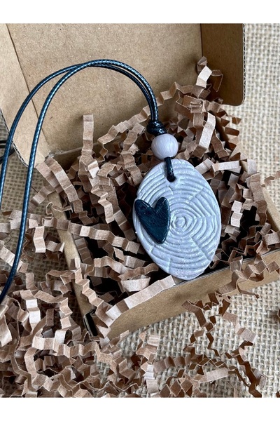 zeinapp Handmade ceramic porcelain necklace with tree bark and heart detail design