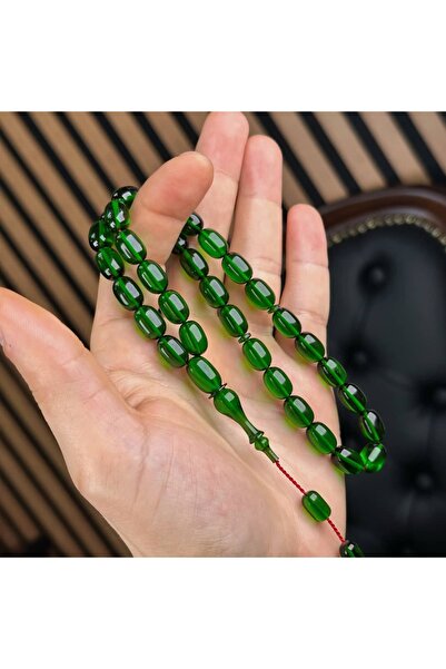 Tasarım سبحة من الزمرد الأخضر والعنبر الناري مع لمسة جذابة ورائعة