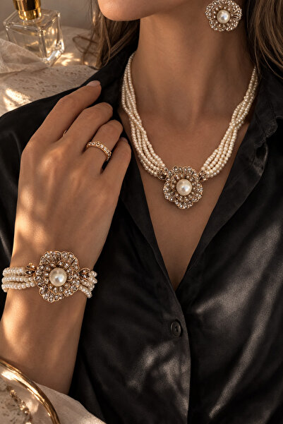 Takkı by Handan hakiki kum inci kolye bileklik ve küpe takım.