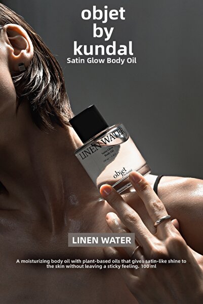 Kundal زيت الجسم الساتان غير اللزج الذي يعطي إحساسًا باللمعان (ماء الكتان)