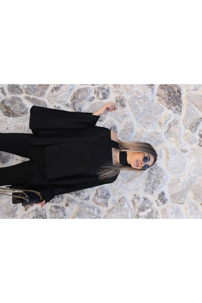 bytugcekaya بلوزة بأكمام الخفاش المفصلة باللون الأسود بالحجم القياسي