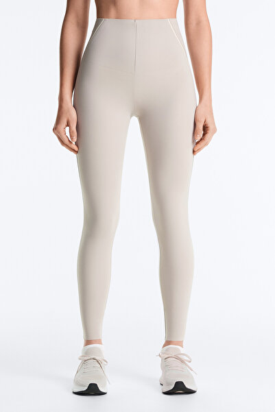 Oysho High rise Compressive fosforlu core control bilek hizasında tayt