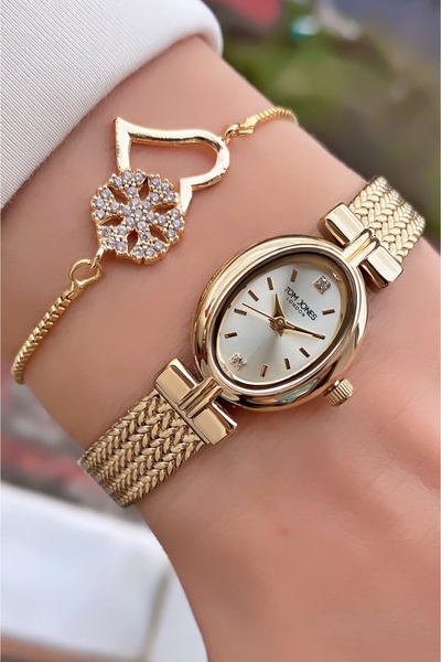 Tom Jones ساعة يد نسائية ماركة ذهبية اللون - سوار