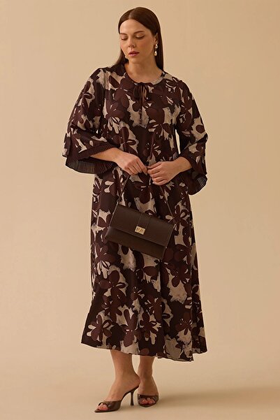 Rain and River Plus size long dress with tie detailing.