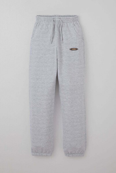 Breeze Pantaloni de trening pentru băieți cu detalii brodate și accesorii cu ...