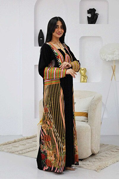 BS A traditional jalabiya with a design inspired by authentic Arab identity, ...