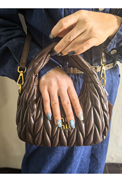 MIUI Small crescent-shaped handbag made of leather