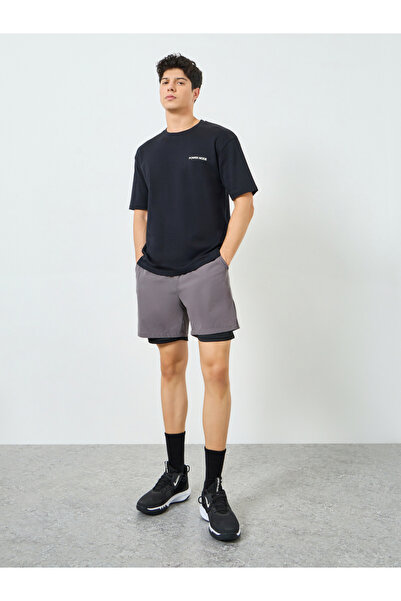 Styli Men Black Minimal Print Oversized T-Shirt