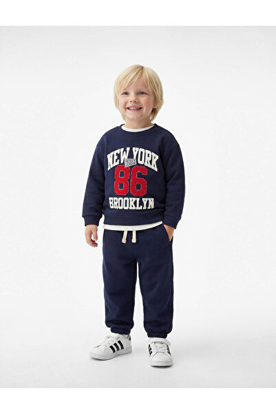 Koton Pantaloni de trening cu buzunare și șireturi în talie, cu picior elastic