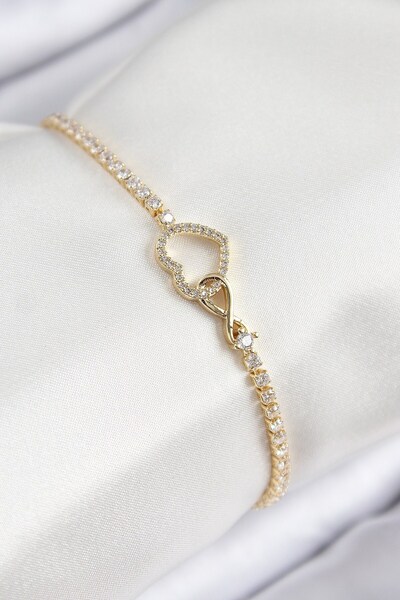 Inure Jewelry سوار نسائي من حجر الزركون والنحاس على شكل قلب لا نهاية له لون ذهبي