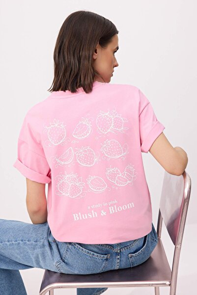 ترينديول كوليكشن تي شيرت وردي مطبوع كبير الحجم/واسع الأكمام قصير الأكمام مصنو...