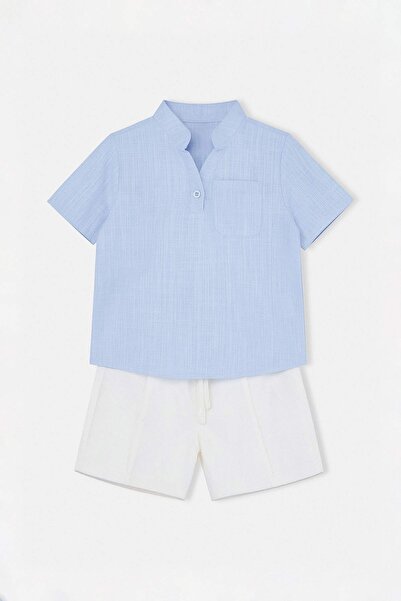 TRENDYOLKIDS Blaues, einfarbig gewebtes Unterteil - Oberteil-Set TKDSS26AU00059