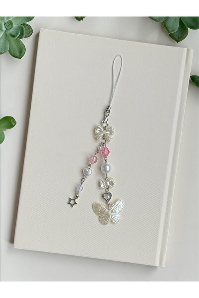 WhimsyWhite حبل هاتف بتصميم فيونكة على شكل فراشة، إكسسوار هاتف وردي مصنوع يدو...