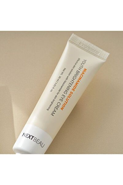 NEXTBEAU NIACINAMIDE SOLUTION YOUTH BRIGHTENING EYE CREAM(NİASİNAMİD İÇERN MO...