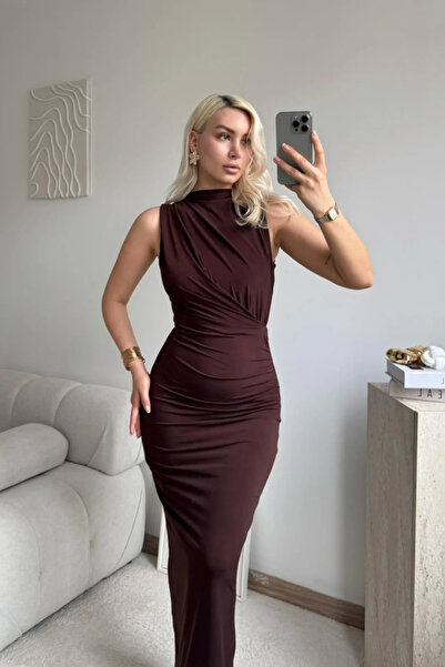 MOZENA Zero Sleeve Mock Neck Drape Detail Slit Long Sandy Dress