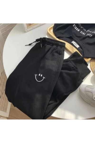 1way Smiley face print track pants – a modern and comfortable design