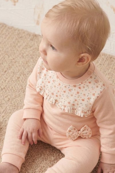 Rocha Baby مجموعة روشا للفتيات الصغيرات بنقشة زهور مكونة من قطعتين - تفاصيل فيونكة طقم سويت شيرت مكون من قطن قطع