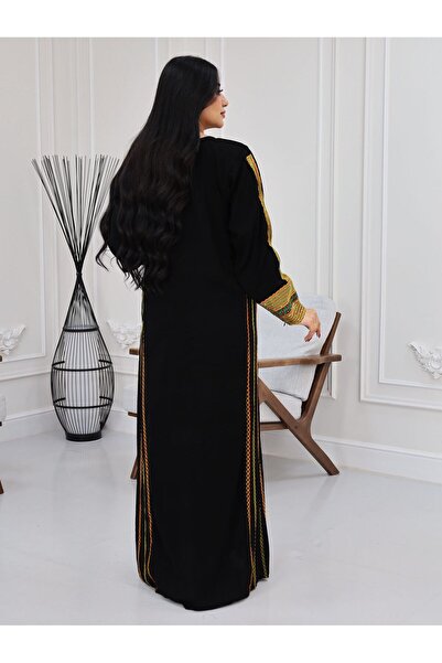 BS A traditional abaya with a design inspired by authentic Arab identity, com...
