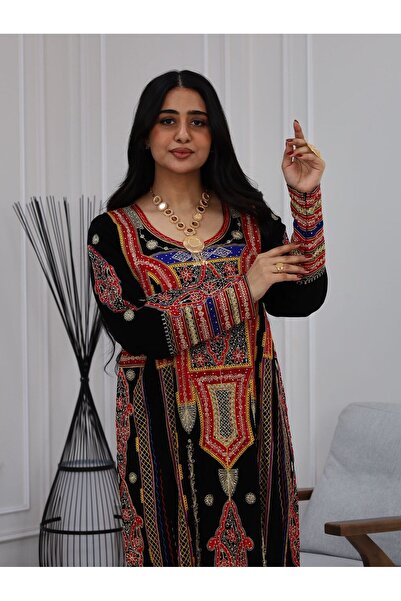 BS A traditional jalabiya with a design inspired by authentic Arab identity, ...