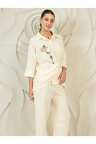 Athena By Styli لفّ قميص وبنطال بلون كريمي مرصّع بالخرز بتفاصيل خرزية