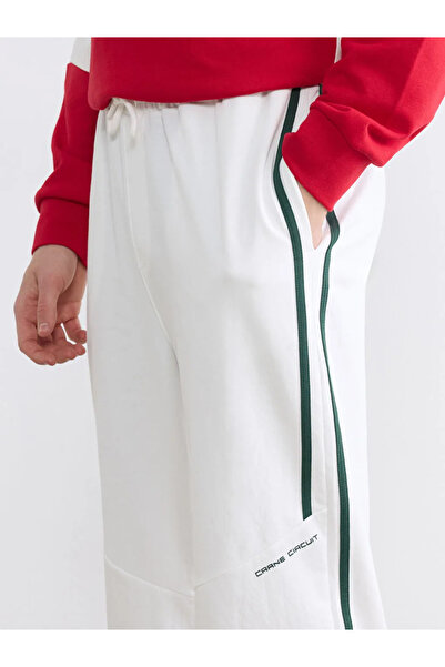 LC Waikiki Ανδρικό παντελόνι φόρμας σε χρώμα εκρού με χαλαρή εφαρμογή και λεπ...