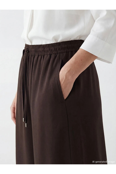 LC Waikiki Καφέ γυναικείο παντελόνι με ελαστική μέση και φαρδύ πόδι