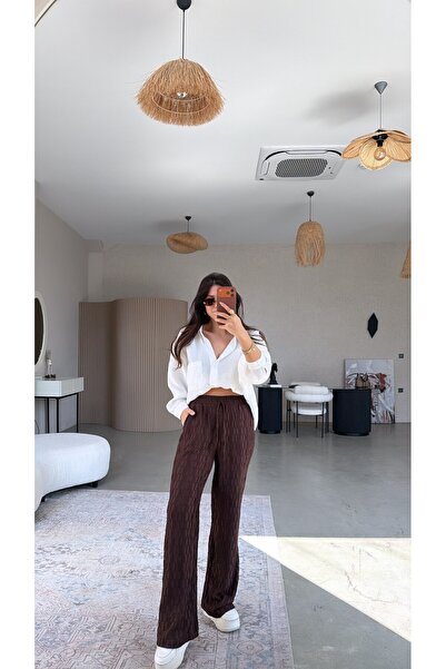 Buket Teke Коричневі штани з крепової тканини на еластичній основі