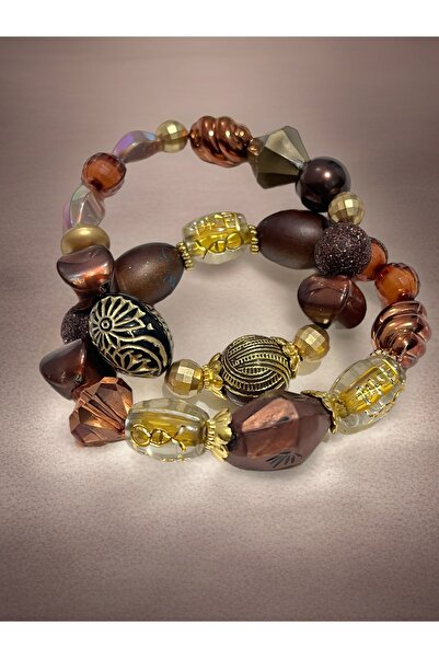 COCOSH TAKI Brown and gold detailed double combination flexible bracelet.