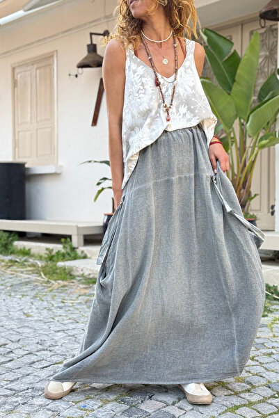 Güneşkızı Італійська антрацитова текстурована асиметрична спідниця вільного т...