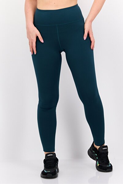 Under Armour بنطلون رياضي نسائي ضيق بشعار ماركة Fit، لون أخضر مخضر