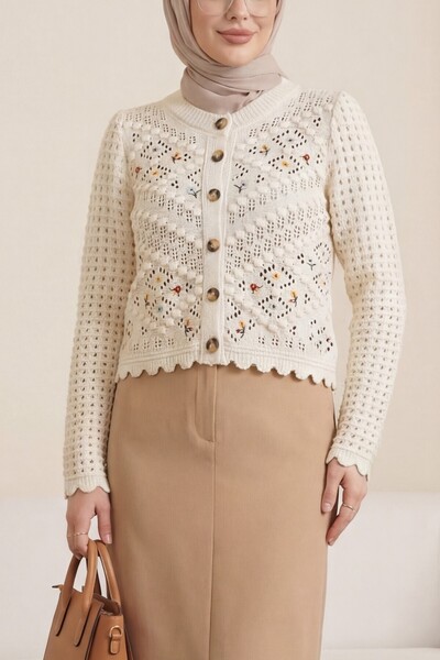 Modamorfo В'язаний кардиган з квітковою вишивкою та помпонами - кремовий