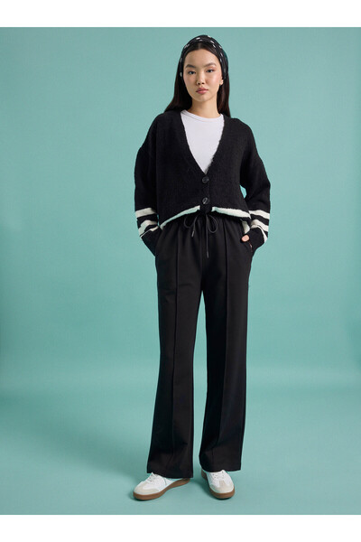 Benin بنطلون رياضي بخياطة محبوكة وخصر مطاطي وقصة مريحة - أسود -