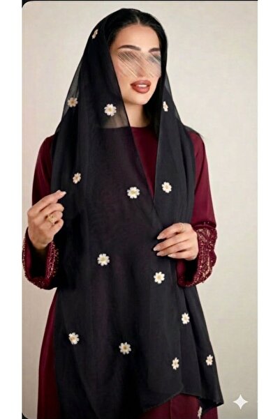 Veil Designer A two-layered black voile veil, offering understated elegance t...