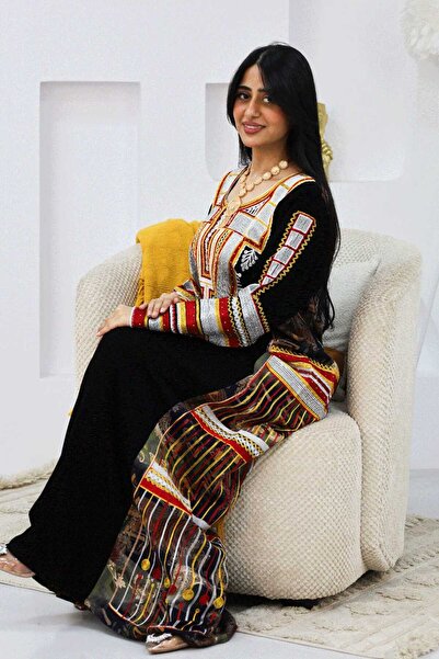 BS A traditional jalabiya with a design inspired by authentic Arab identity, ...