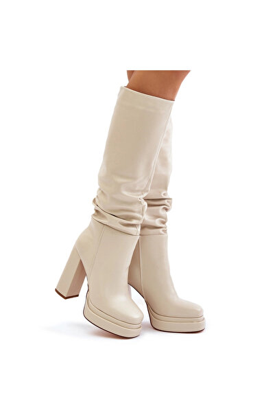 BOTO Slip-on ankle boots on a heel and platform with gathering warm light bei...