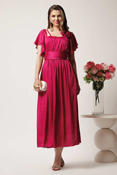 DyFashion Long fuchsia dress in a cloche made of veil with flower at the bust