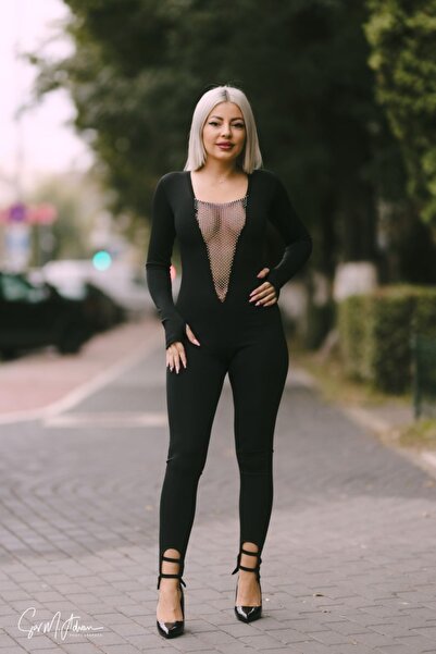 Angy Fashion Black form-fitting jumpsuit with a plunging neckline and shiny t...