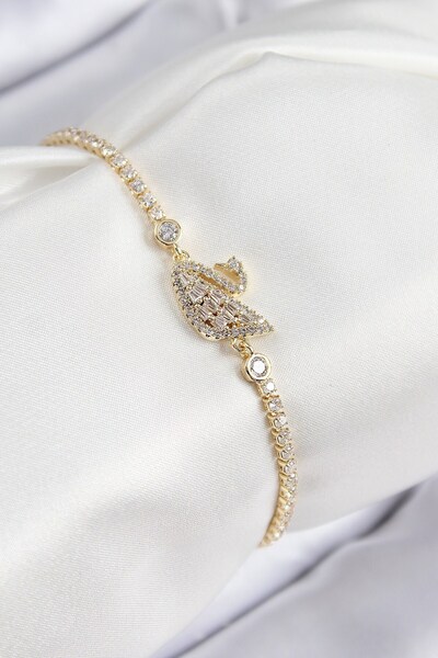 Inure Jewelry سوار نسائي من النحاس والزركون بحجر البجعة موديل ذهبي اللون