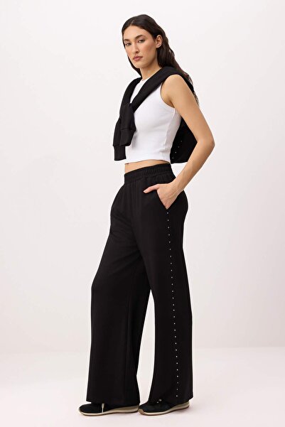 Trendyol Kollektion Schwarze, weit geschnittene, elastische Strick-Jogginghos...