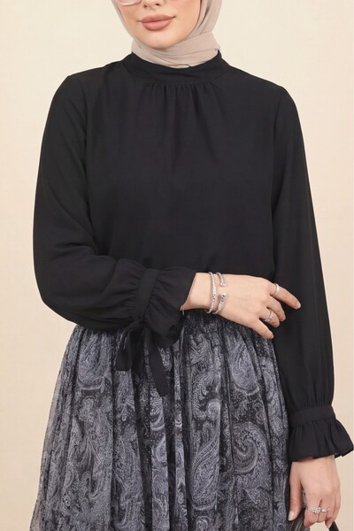 HİJABAYA Μπλούζα από κρεπ με ψηλό γιακά, βολάν στα μανίκια, κορδόνια και φερμ...